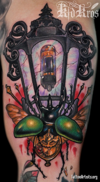 Antique Beetle Lantern Tattoo On Arm