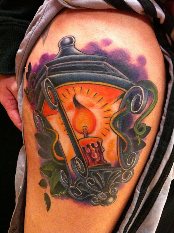 Attractive Candle Lantern Tattoo On Left Shoulder
