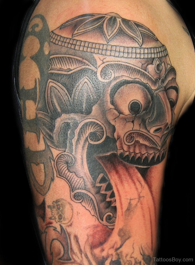 Attractive Grey Tibetan Skull Tattoo On Right Half Sleeve