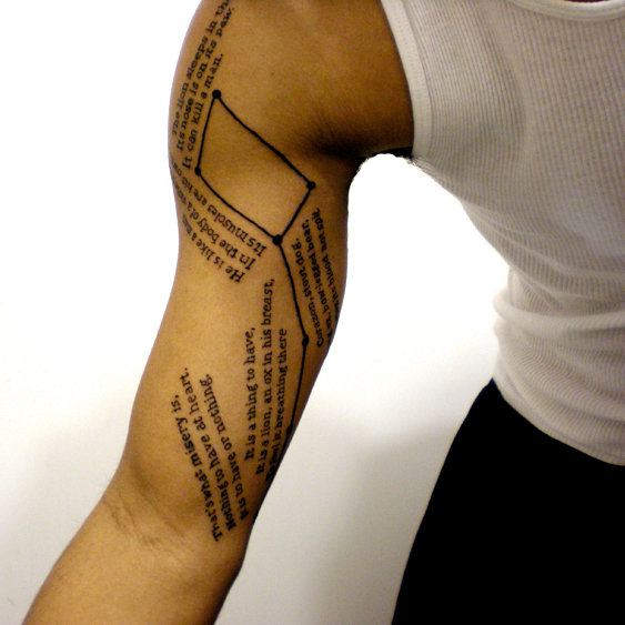 Attractive Poem Tattoo On Biceps For Men