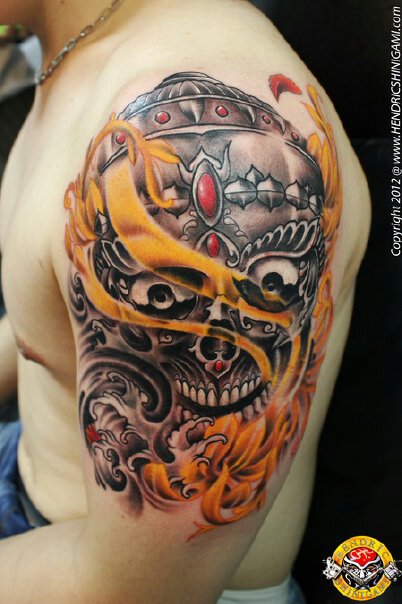 Attractive Tibetan Skull Tattoo On Left Half Sleeve By Bengkel1688