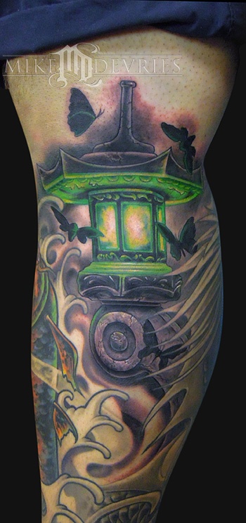 Awesome Green Chinese Lantern And Waves Tattoo