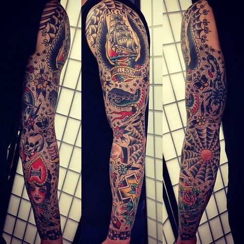 Awesome Old School Tattoo On Left Full Sleeve
