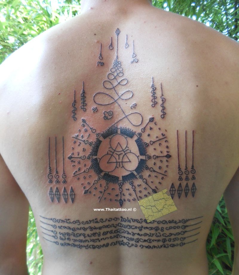 Awesome Thai Symbols Tattoo On Back