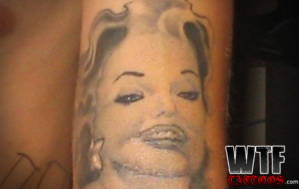 Awful Marilyn Monroe Tattoo On Arm