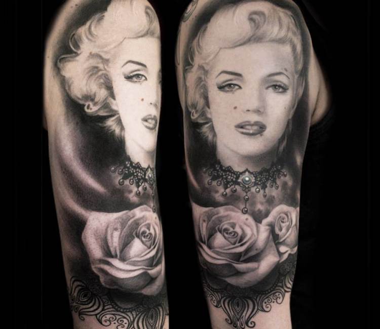 Beautiful Marilyn Monroe Portrait Tattoo On Half Sleeve