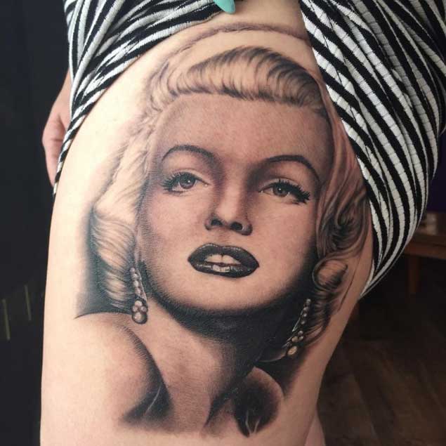 Beautiful Marilyn Monroe Portrait Tattoo On Left Thigh