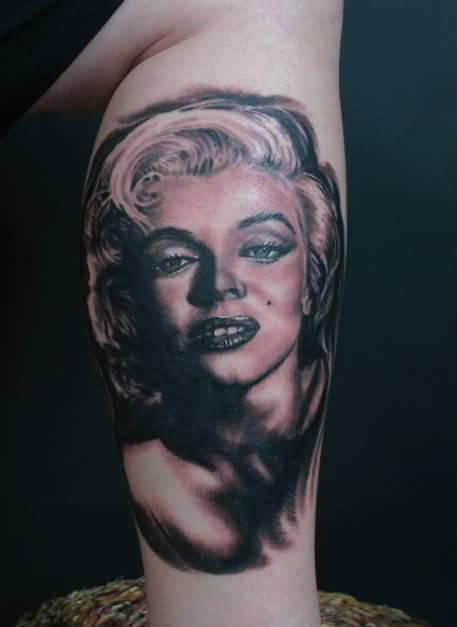 Black And Grey Marilyn Monroe Portrait Tattoo On Leg