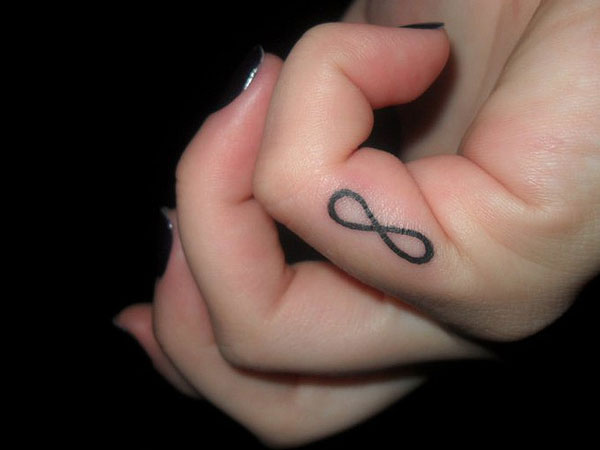 Black Infinity Symbol Tattoo On Finger For Girls