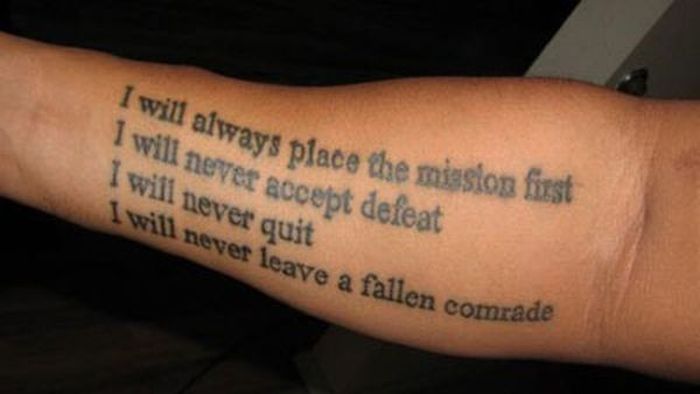 Black Ink Military Poem Tattoo On Forearm