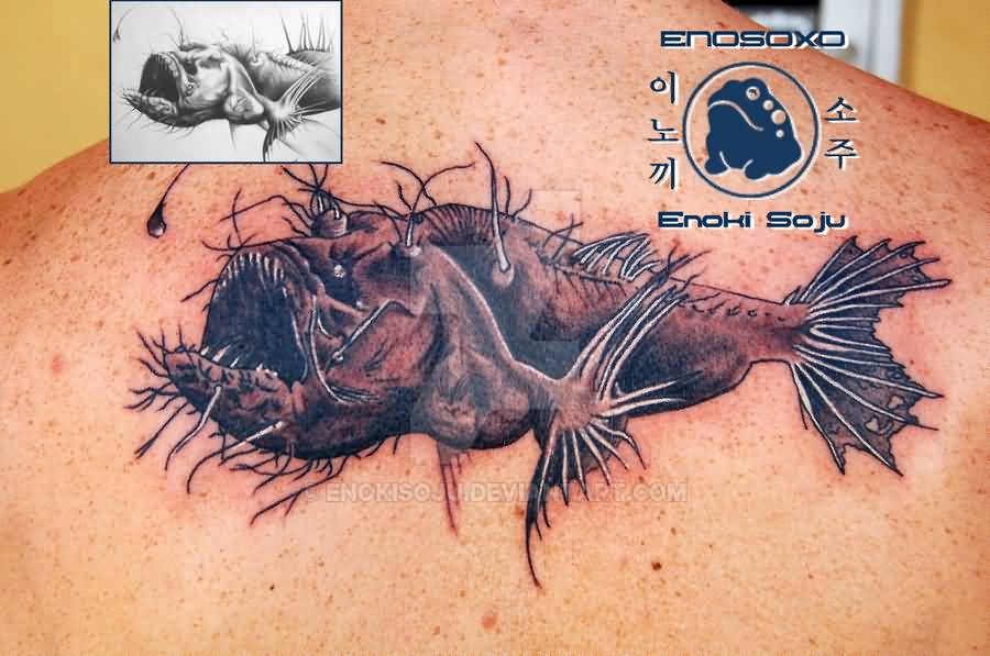 Brilliant Angler Fish Tattoo On Upper Back By Enoki Soju