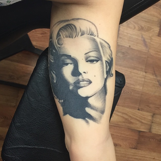 Brilliant Grey Marilyn Monroe Tattoo On Biceps