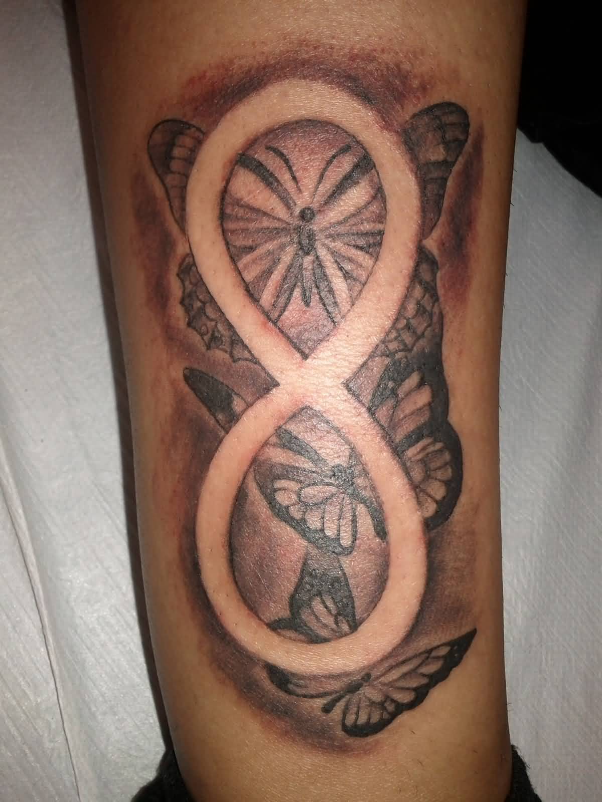 Brilliant Infinity Symbol With Butterflies Tattoo