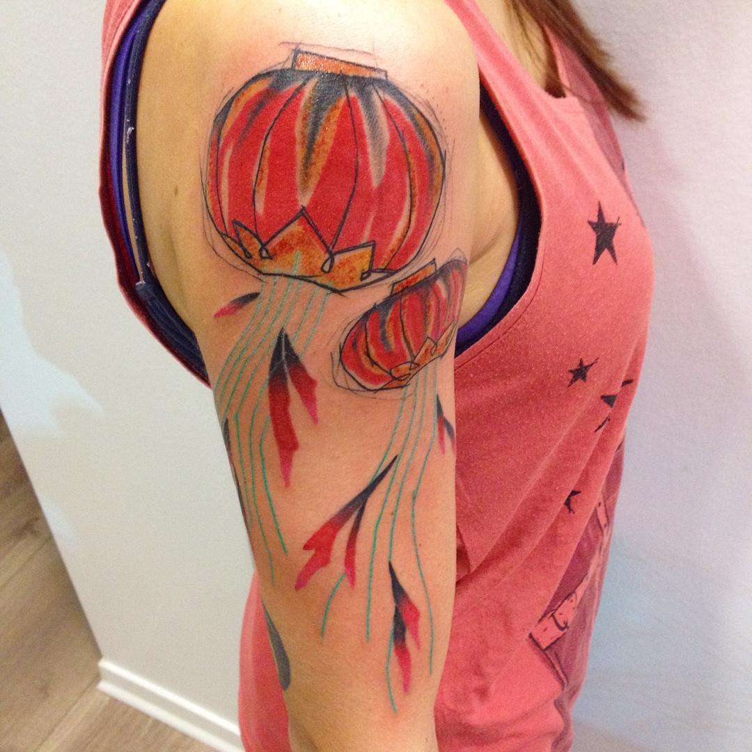Chinese Sky Lanterns Tattoo On Right Half Sleeve For Girls