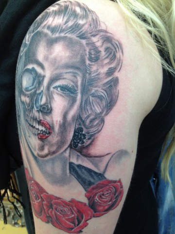 Colored Marilyn Monroe Skull With Roses Tattoo On Half Sleeve