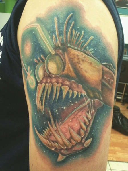Colored Scary Angler Fish Tattoo On Left Shoulder