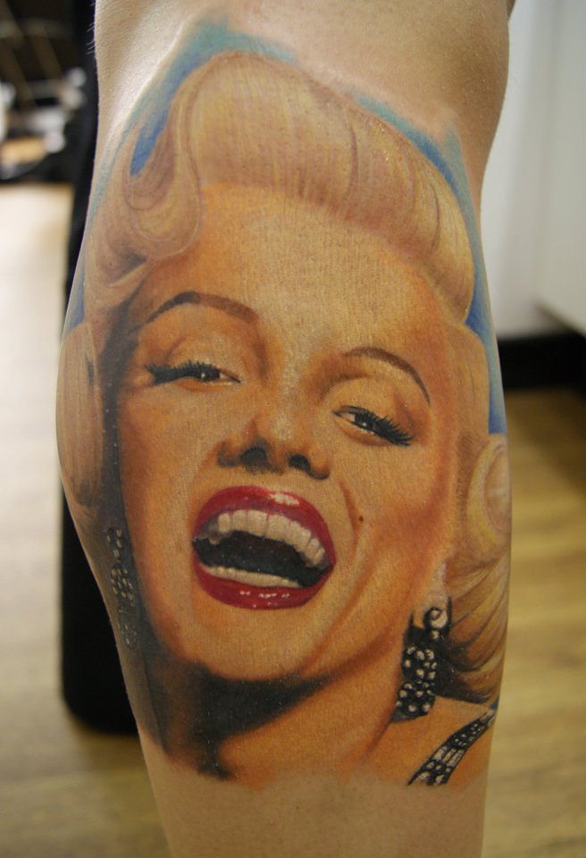 Colorful Laughing Marilyn Monroe Portrait Tattoo