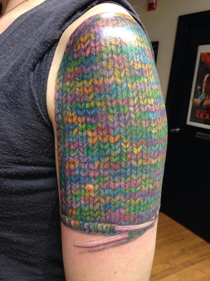 Colorful Stockinette Stitch Knitting Tattoo On Left Half Sleeve