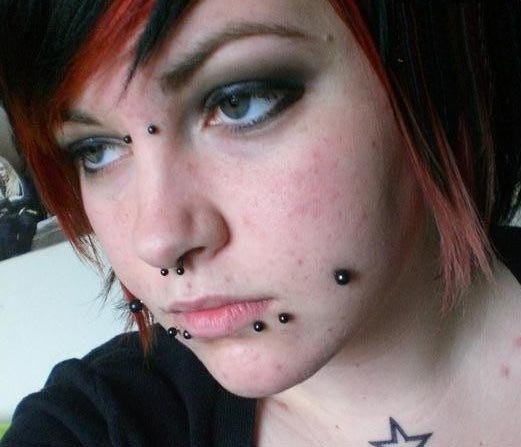 Dimple Cheeks And Shark Bites Piercing With Black Studs