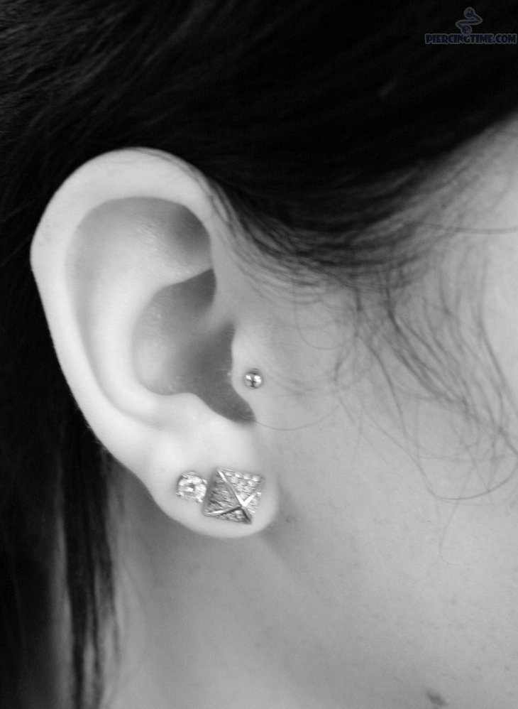 Dual Lobes And Tragus Piercing With Silver Stud