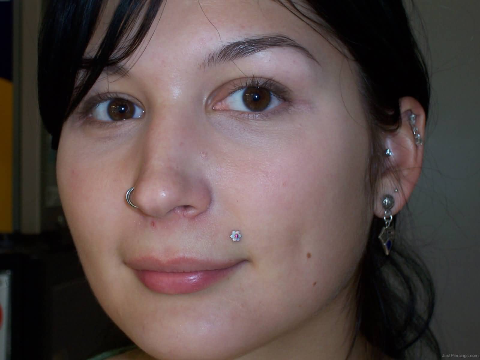 Dual Nostril And Monroe Piercing With Flower Stud