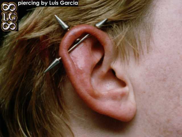 Girl With Industrial Ear Project Piercing