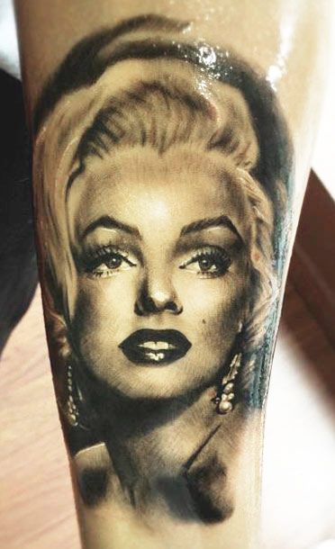 Gorgeous Marilyn Monroe Portrait Tattoo On Forearm