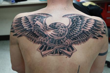 Grey And Black Old School Eagle Tattoo On Upper Back