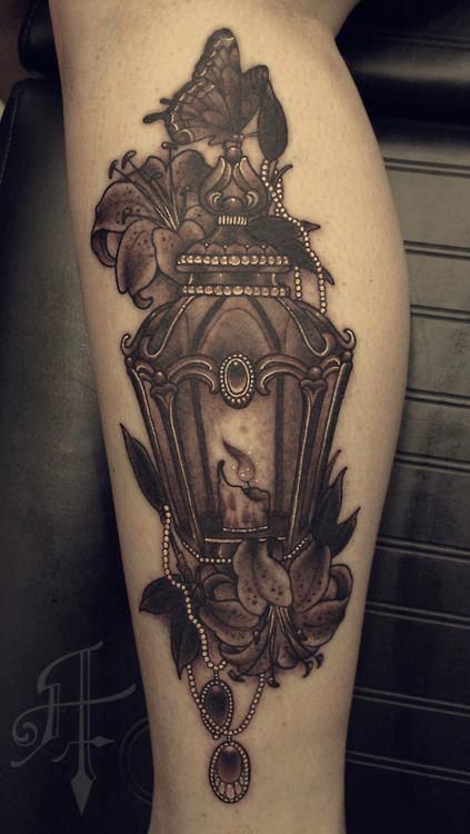 Grey Butterfly With Antique Lantern Tattoo On Leg