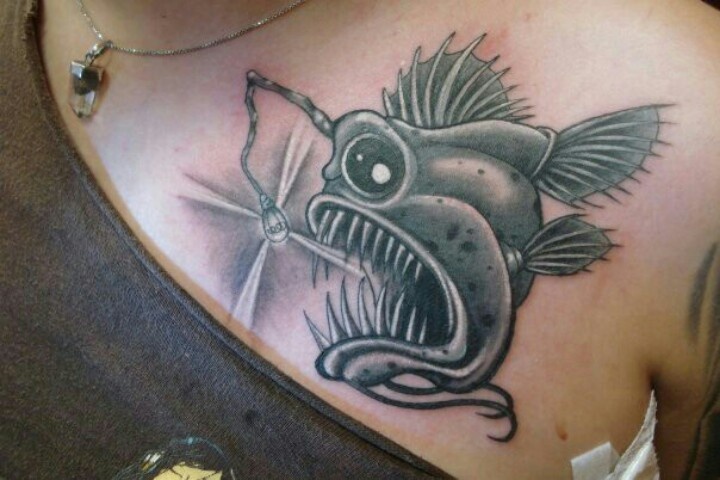 Grey Electric Angler Fish Tattoo On Left Chest