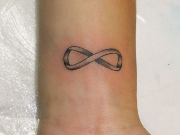 Grey Infinity Symbol Tattoo On Wrist