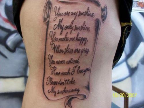 Grey Ink Love Poem Tattoo On Back