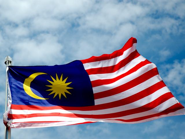 Happy Malaysia Day Waving Malaysian Flag Picture