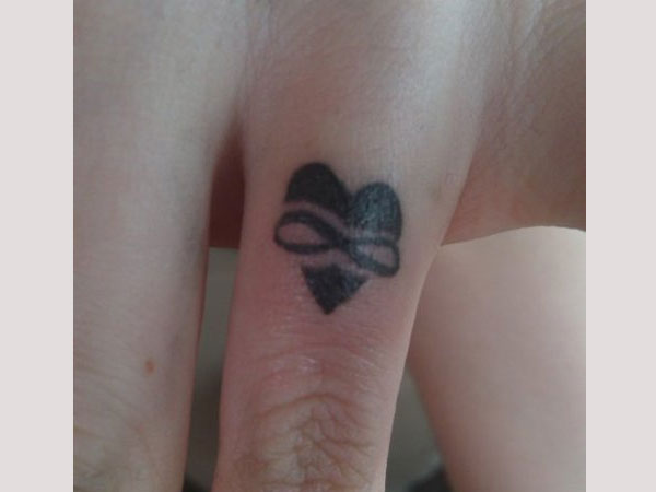 Heart Shape With Infinity Tattoo On Finger