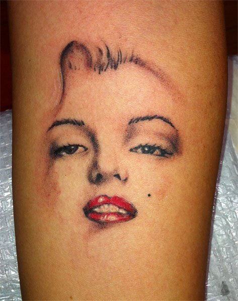 Impressive Marilyn Monroe Face Portrait Tattoo By Mel K