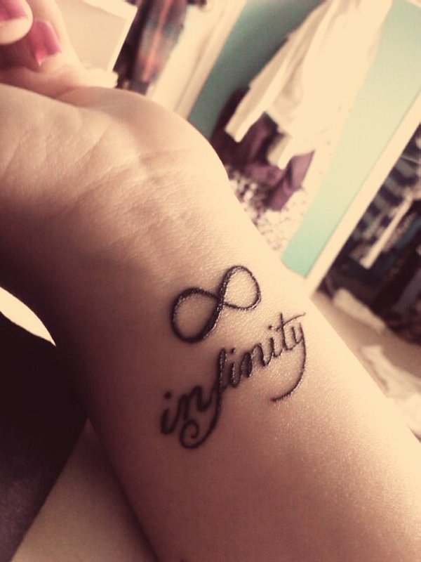 Infinity Symbol With Word Tattoo On Left Wrist