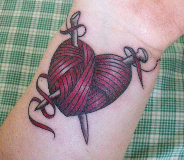 Knitting Needles In Yarn Heart Tattoo On Wrist