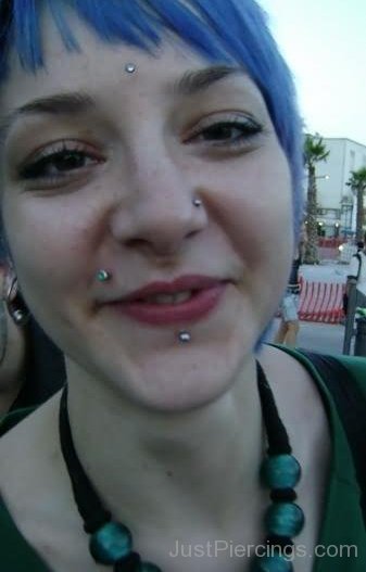 Labret And Monroe Piercing For Women.