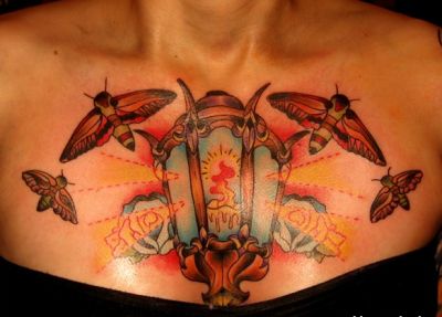 Lantern And Moths Tattoo On Chest For Girls