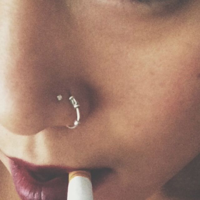Left Nostril Piercing With Hoop Ring