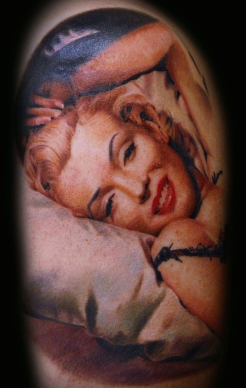 Lying Marilyn Monroe Portrait Tattoo