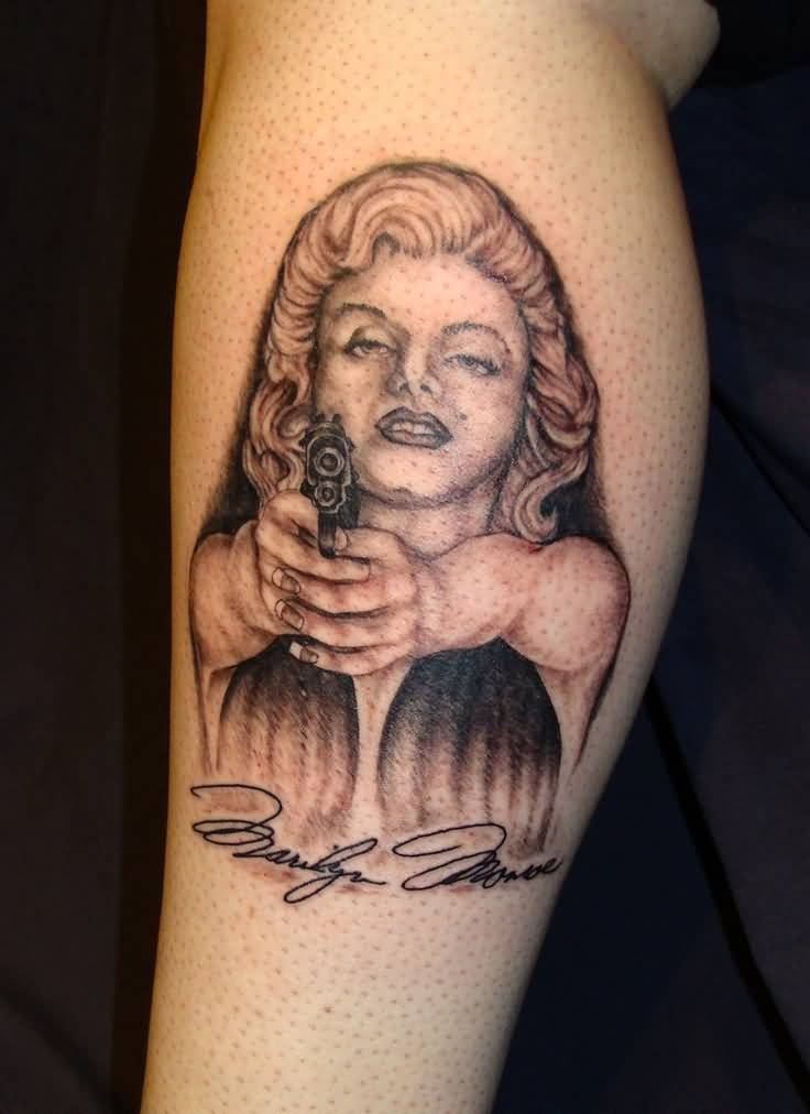 Marilyn Monroe And Gun Tattoo On Leg