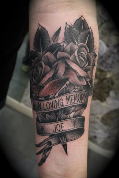 Memorial Black Rose Flowers Tattoo On Forearm