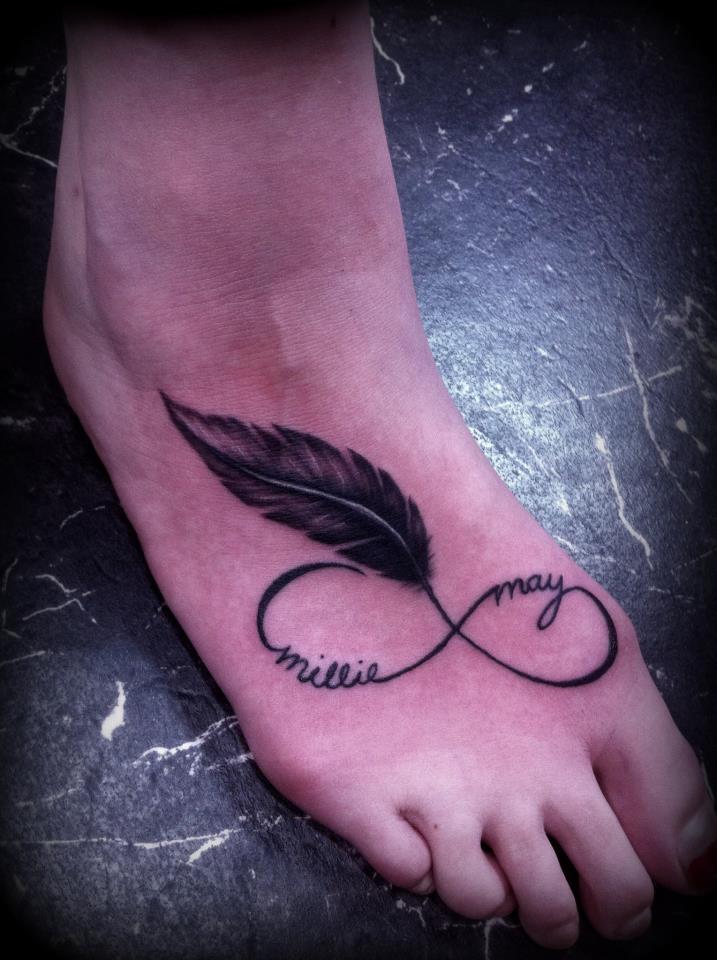 Name Infinity Symbol With Feather Tattoo On Foot