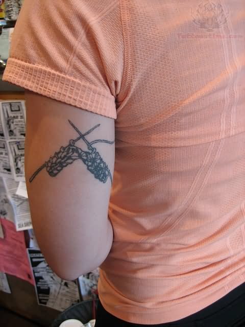 Needles Knitting Tattoo On Triceps
