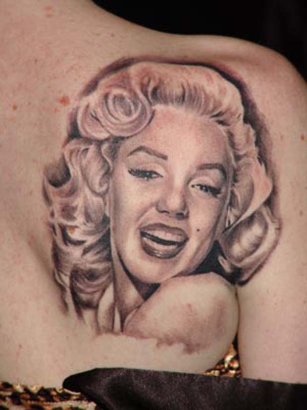 Nice Happy Marilyn Monroe Portrait Tattoo
