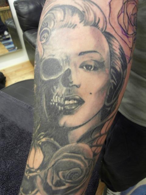 Nice Marilyn Monroe Skull Tattoo On Forearm