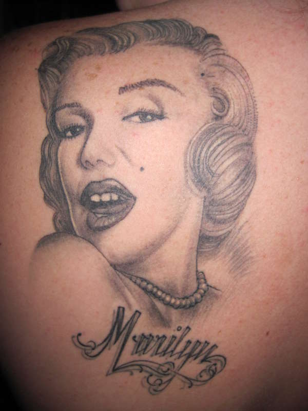 Nice Marilyn Monroe Tattoo On Back Shoulder