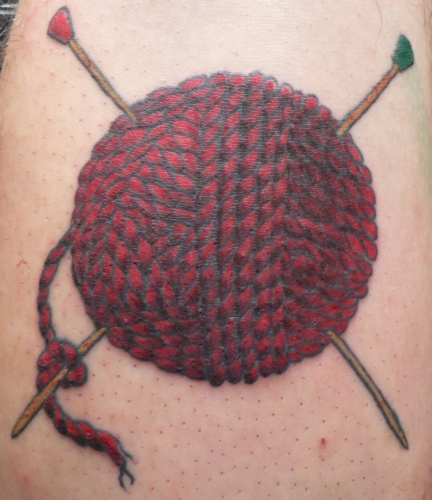 Nice Red Yarn Ball With Knitting Needles Tattoo