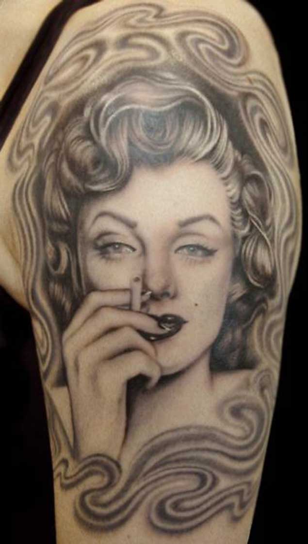 Nice Smoky Marilyn Monroe Tattoo On Left Half Sleeve